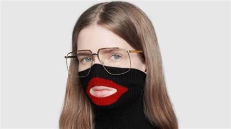 gucci in their black sweater mask|Gucci sweater controversy.